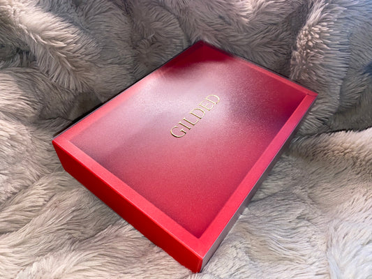 THE GILDED RED BOX